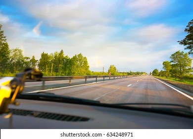 View Of The Road Layout Of Car Windshield View Of The Rainbow And The Sky