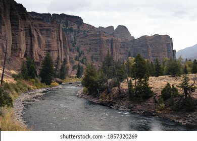 View of rock formations and the Nork Fork Shoshone River near Cody, Wyoming in fall - Shutterstock ID 1857320269