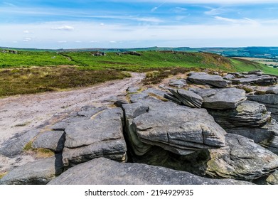 A View Of Rock Strata On The Top Of Bamford Edge, UK In Summertime