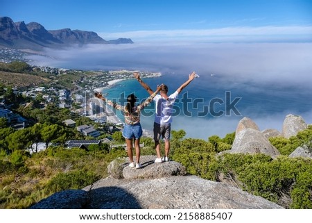View from The Rock viewpoint in Cape Town over Campsbay, view over Camps Bay with fog over the ocean. fog coming in from the ocean at Camps Bay Cape Town South Africa