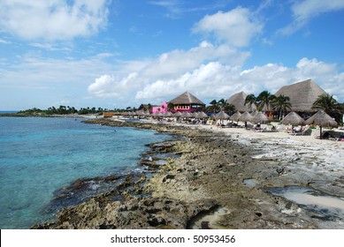 The View Of Rocky Costa Maya Beach In Mahahual Town (Mexico).