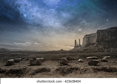 View Of A Rocky Desert Landscape At Dusk