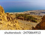 View of rocky desert landscape in Ein Gedi Nature Reserve, with the Dead Sea, Southern Israel