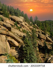 View Of The Rocky Mountain Hillside At Sunset From A Pikes Peak Cog Railway Train