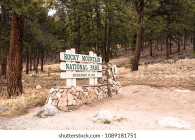 View From Rocky Mountain National Park In Colorado With Sign Indicating Entrance From Estes Park Gate