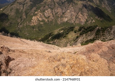 View of the rocky precipice, forest and steep mountains, from the top of the hill.  - Shutterstock ID 2147968931