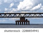 View of the Rollemberg-Vuolo railroad Bridge, is a mixed bridge that serves to cross pedestrians, cyclists, motorcycles, automobiles and railway trains. It connects the Brazilian states of Mato Grosso