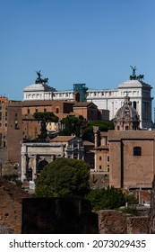 View of the Roma Imperiale (Imperial Rome) and the Colosseo and Forum in Roma, Lazio, Italy.