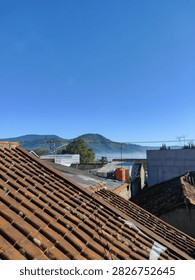 the view of rooftiles and mountains