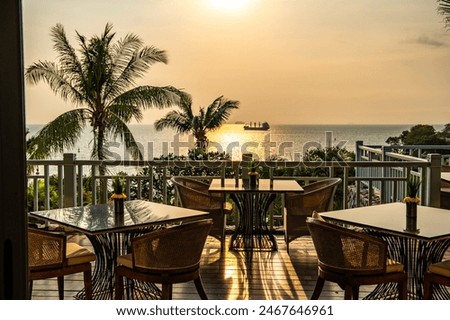 View of rooftop bar at sunset in Cape Panwa beach in Phuket, Thailand