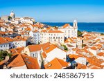 View of rooftops and skyline of Alfama district, the oldest neighborhood of Lisbon in Portugal