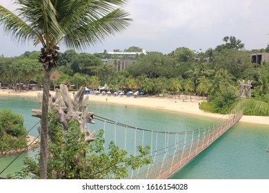 View Of The Rope Bridge Over The Bay And View Of The Beach From The Other Side Of The Bridge