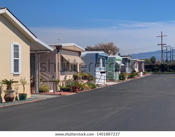 View of row of\
mobile homes in trailer\
park.