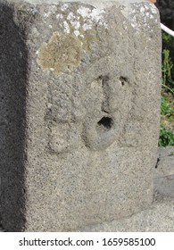 View Of The Ruins Of A Water Fountain With A Face Sculpture Located In Pompeii, Italy