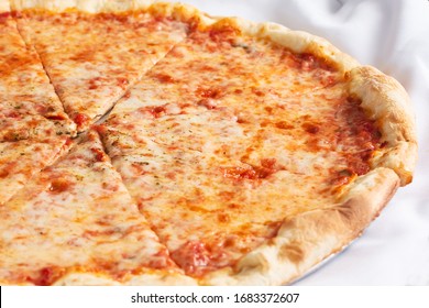 A View Of A Rustic Plain Cheese Pizza Pie.