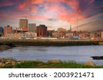 View of Saint John, New Brunswick, in the evening on the Bay of Fundy in the Maritime Provinces of Canada with beautiful colorful sunset