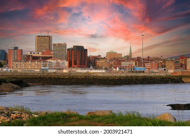 View of Saint John, New Brunswick, in the evening on the Bay of Fundy in the Maritime Provinces of Canada with beautiful colorful sunset