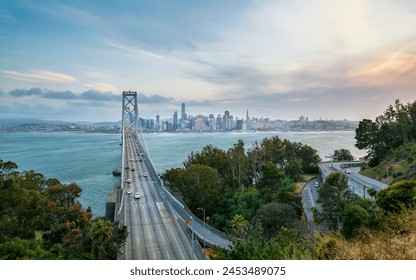 View of San Francisco skyline and Oakland Bay Bridge from Treasure Island at sunset, San Francisco, California, United States of America, North America - Powered by Shutterstock