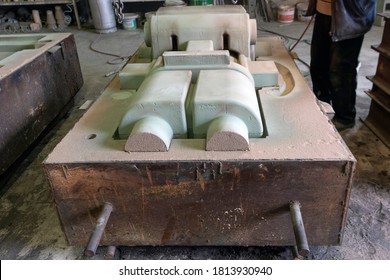 View of the sand mold for steel casting. Sand casting, also known as sand molded casting, is a metal casting process characterized by using sand as the mold material. - Powered by Shutterstock