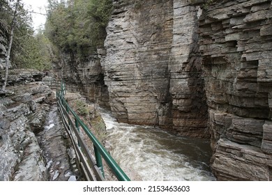 View of sandstone cliffs and the Ausable River along the Inner Sanctum Trail at Ausable Chasm in Keeseville, New York