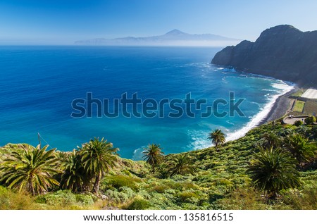 View of Santa Catalina beach and mountains with Tenerife island in the background, La Gomera island