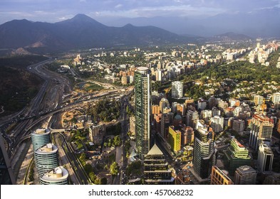 View Of Santiago De Chile At Sunset Time With Los Andes Mountain Range In The Back