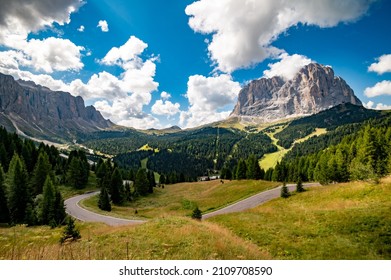 View of Sassolungo Langkofel mountain from Selva. Gardena Pass, Trentino Alto Adige, Italy. Sassolungo mountain in background. Passo Gardena, alpine pass between Val Badia and Val Gardena, South Tyrol