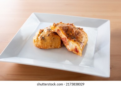 A View Of A Savory Pizza Pocket Appetizer.