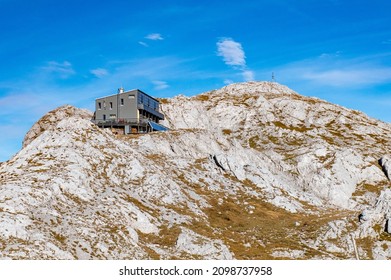 View Of The Schiestlhaus Mountain Hut Refugio On Top Of The Hochschwab Moutain, Sunny Weather, Sunset, Blue Sky. Autumn Vibes In Mountain Range Hochschwab, Styria, Austrian Alps, Austria, Europe.