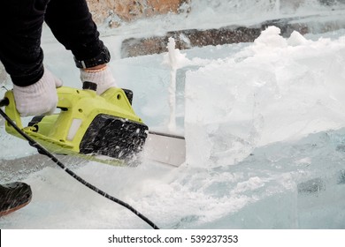 View Of Sculptor Carving Ice. Movement.