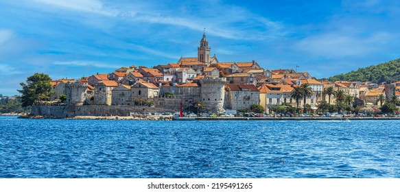 View from the sea of the medieval town of Korcula in Croatia, located on the Dalmatian coast. The Statute of Korčula was first drafted in 1214. Birthplace of famous navigator Marco Polo. - Shutterstock ID 2195491265
