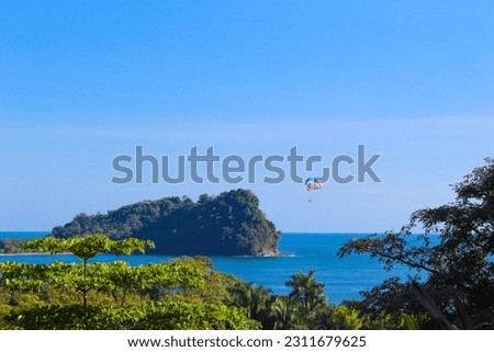 View of the seascape from the viewpoint.  Enjoying in parasailing.  Manueloantonio beach.  Pacificocean 
