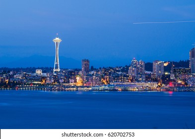 View of Seattle downtown with Space Needle iconic from Alki Beach at blue hour . - Powered by Shutterstock