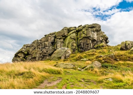 A view of a section of the summit of the Almscliffe crag in Yorkshire, UK in summertime