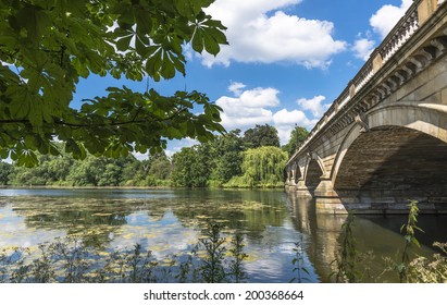 View Of Serpentine Lake And Serpentine Bridge In Hyde Park In The Summer, London, UK 