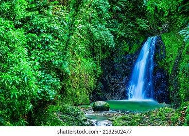 A view of Seven Sisters Waterfalls in the jungle on Grenada - Shutterstock ID 2132502477