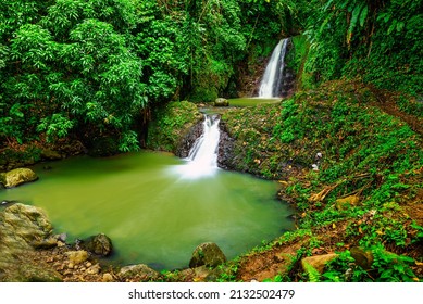 A view of Seven Sisters Waterfalls in the jungle on Grenada - Shutterstock ID 2132502479