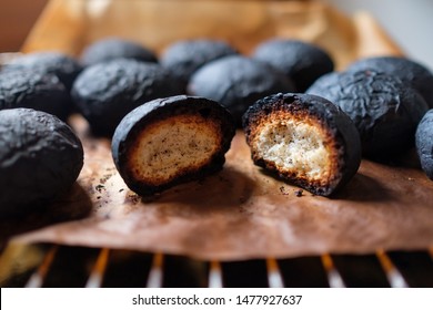 View Of Several Spoiled Burnt Bread. Charred Food.
