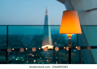 View of the Shard from a balcony at dusk - Shutterstock ID 2366896583