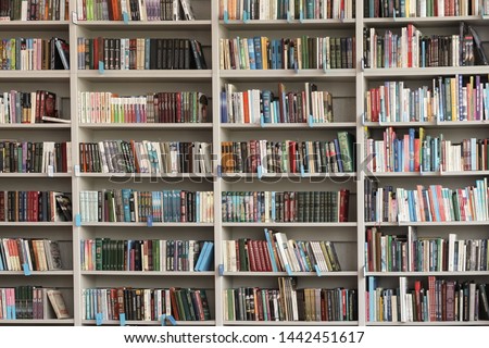 View of shelves with books in library