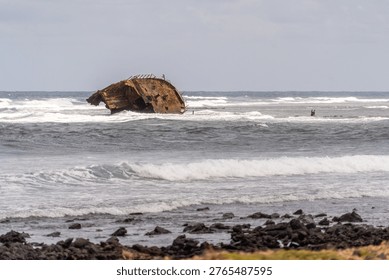 view of a shipwreck in the ocean