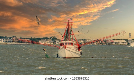 View Of Shrimp Boat At Sunset