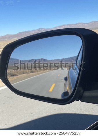 a view from the side view mirror