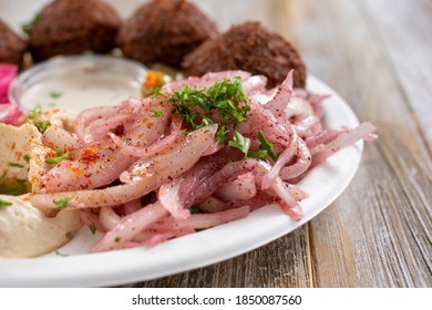 A View Of A Side Of Sumac Onions, Part Of A Falafel Entree Plate.