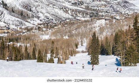 View Of Skiers Skiing At The Aspen Snowmass Ski Resort In The Rocky Mountains Of Colorado.