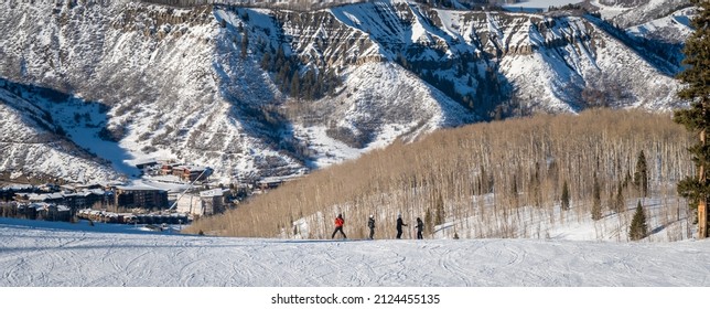 View Of Skiers Skiing At The Aspen Snowmass Ski Resort In The Rocky Mountains Of Colorado.