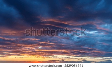 view of sky with clouds at sunset