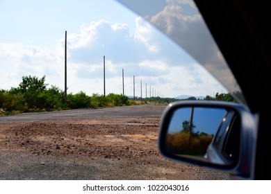 View of sky when looking out of the car window.