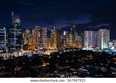 View of the skyline of Makati at night, in Metro Manila, The Philippines.