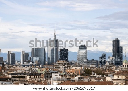 View of the skyline of Milan from the Duomo rooftop , on the background the newly developed financial quarter area near Porta Garibaldi 